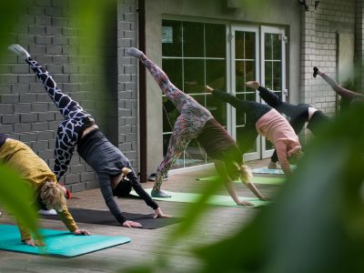 group doing yoga outside